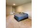 Large bedroom featuring bed, seating area, and doorway at 776 Woodstock Grove Dr, Woodstock, GA 30188