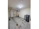 Spacious two-car garage with room for storage and overhead racks at 803 Arbor Gate Ln, Lawrenceville, GA 30044