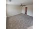 Spacious main bedroom with a ceiling fan and access to the bathroom at 803 Arbor Gate Ln, Lawrenceville, GA 30044