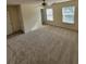Spacious main bedroom with a ceiling fan and three windows at 803 Arbor Gate Ln, Lawrenceville, GA 30044