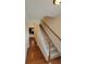 Bright and welcoming staircase with carpet steps and hardwood floors in entry way at 803 Arbor Gate Ln, Lawrenceville, GA 30044