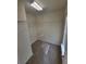 Bright walk-in closet with shelving and neutral carpeting at 803 Arbor Gate Ln, Lawrenceville, GA 30044