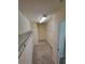 Spacious walk-in closet featuring ample shelving and neutral carpeting at 803 Arbor Gate Ln, Lawrenceville, GA 30044