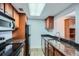 Cozy kitchen featuring granite countertops, stainless steel appliances, and wooden cabinets at 1280 W Peachtree Nw St # 3514, Atlanta, GA 30309