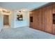 The spacious living room boasts a custom wardrobe and a breakfast bar to the kitchen at 1280 W Peachtree Nw St # 3514, Atlanta, GA 30309