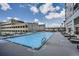 Relaxing outdoor swimming pool with lounge chairs for residents to enjoy the sunshine at 1280 W Peachtree Nw St # 3514, Atlanta, GA 30309