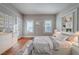 Cozy bedroom with hardwood floors, ample natural light, and stylish decor at 1453 Graham Sw St, Atlanta, GA 30310