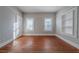 Bedroom features neutral decor, hardwood floors, and lots of natural light at 1453 Graham Sw St, Atlanta, GA 30310