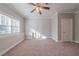 Bright bedroom with neutral decor, ceiling fan, and natural light at 1453 Graham Sw St, Atlanta, GA 30310