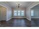 Large living room with luxury vinyl plank flooring, fresh paint and lots of natural light at 1453 Graham Sw St, Atlanta, GA 30310