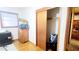Bright bedroom featuring hardwood floors, a closet, and window at 1723 Fort Valley Sw Dr, Atlanta, GA 30311