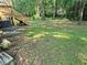 Large backyard with stairs and lush green grass at 3975 Northstrand Dr, Decatur, GA 30035