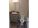 This bathroom features a modern vanity and stylish wood flooring at 3975 Northstrand Dr, Decatur, GA 30035