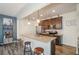 Spacious kitchen with stainless steel appliances, granite countertop, and wood floors at 426 Mulberry Se Row, Atlanta, GA 30354