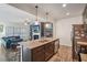 This is a kitchen island with granite countertop and stainless steel appliances at 426 Mulberry Se Row, Atlanta, GA 30354