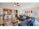 Open-concept living area with hardwood floors connecting to the kitchen at 426 Mulberry Se Row, Atlanta, GA 30354