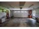 Spacious two car garage with ample room for parking and storage at 4714 Marc Sw Ct, Lilburn, GA 30047