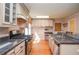Well-equipped kitchen with hardwood floors, stainless steel appliances, and ample counter space for cooking enthusiasts at 4714 Marc Sw Ct, Lilburn, GA 30047