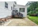 Cozy outdoor area with steps, perfect for enjoying the serene backyard and garden views at 4714 Marc Sw Ct, Lilburn, GA 30047