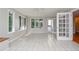 Bright sunroom with tile floor and large windows at 4714 Marc Sw Ct, Lilburn, GA 30047