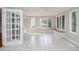 Bright sunroom with large windows and a window seat at 4714 Marc Sw Ct, Lilburn, GA 30047
