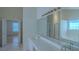 Bathroom with double sinks, tub and shower at 851 Roget Ct, Lawrenceville, GA 30045