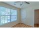 Cozy bedroom with ample natural light from the window, and standard closet at 851 Roget Ct, Lawrenceville, GA 30045
