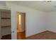 Bedroom with closet and shelves, doorway to bathroom at 851 Roget Ct, Lawrenceville, GA 30045