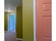 Hallway featuring multiple doorways and carpeted floors at 851 Roget Ct, Lawrenceville, GA 30045
