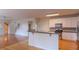 Open concept kitchen with stainless steel appliances and breakfast bar at 851 Roget Ct, Lawrenceville, GA 30045