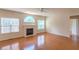 Inviting living room with a cozy fireplace and large windows, creating a warm and welcoming atmosphere at 851 Roget Ct, Lawrenceville, GA 30045