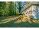 Large backyard with grass and trees at 1555 Rupert Rd, Decatur, GA 30032