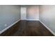 Bedroom showing hardwood floors, grey walls, white trim and door at 1555 Rupert Rd, Decatur, GA 30032
