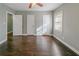 Bedroom with hardwood floors, ceiling fan and ample natural light at 1555 Rupert Rd, Decatur, GA 30032