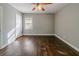 Bedroom with hardwood floors and window at 1555 Rupert Rd, Decatur, GA 30032