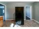 Functional kitchen space showing neutral walls and floors, as well as the refrigerator at 1555 Rupert Rd, Decatur, GA 30032