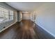 Light filled living room showing refinished hardwood floors and ample natural light at 1555 Rupert Rd, Decatur, GA 30032
