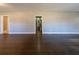 Inviting living room featuring freshly refinished hardwood floors at 1555 Rupert Rd, Decatur, GA 30032