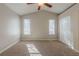 Neutral bedroom with vaulted ceiling, ceiling fan, and closet at 2105 Sandtree Sw Ct, Atlanta, GA 30331