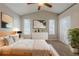 Bright primary bedroom with vaulted ceilings, neutral paint, and a serene atmosphere at 2105 Sandtree Sw Ct, Atlanta, GA 30331