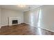 Inviting living room featuring a fireplace and sliding glass doors to the outside at 2105 Sandtree Sw Ct, Atlanta, GA 30331