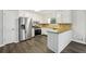 Well-equipped kitchen with stainless steel appliances, granite counters, and a convenient island layout at 2920 Cushing Ct, Jonesboro, GA 30236