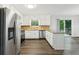 Modern kitchen with stainless steel appliances, granite countertops, and ample cabinet space, ready for culinary adventures at 2920 Cushing Ct, Jonesboro, GA 30236