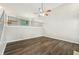 Spacious living room with hardwood floors, soaring ceilings, and an open balcony, perfect for entertaining at 2920 Cushing Ct, Jonesboro, GA 30236