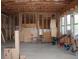 Unfinished basement with exposed wood framing, offering potential for future customization at 4933 Greenard Watson Ln, Buford, GA 30518