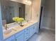 Bathroom with a double sink vanity, tiled floors, and contemporary fixtures at 4933 Greenard Watson Ln, Buford, GA 30518