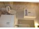 Bright bathroom with tiled walls, vanity with modern hardware, and ample storage providing a clean, updated design at 4933 Greenard Watson Ln, Buford, GA 30518
