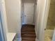 Hallway with seating area leading to a bathroom at 4933 Greenard Watson Ln, Buford, GA 30518