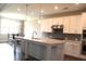 Stylish kitchen with white cabinetry, a large central island, and stainless steel appliances at 4933 Greenard Watson Ln, Buford, GA 30518