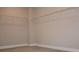 Spacious walk-in closet featuring wire shelving on multiple walls for organization and storage at 4933 Greenard Watson Ln, Buford, GA 30518